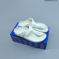 Gizeh-Style Buckle Thong Sandals by Birkenstock - product image from the listing.