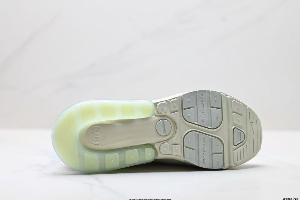Light Green and White Nike Air Zoom Sneakers - product image from the listing.