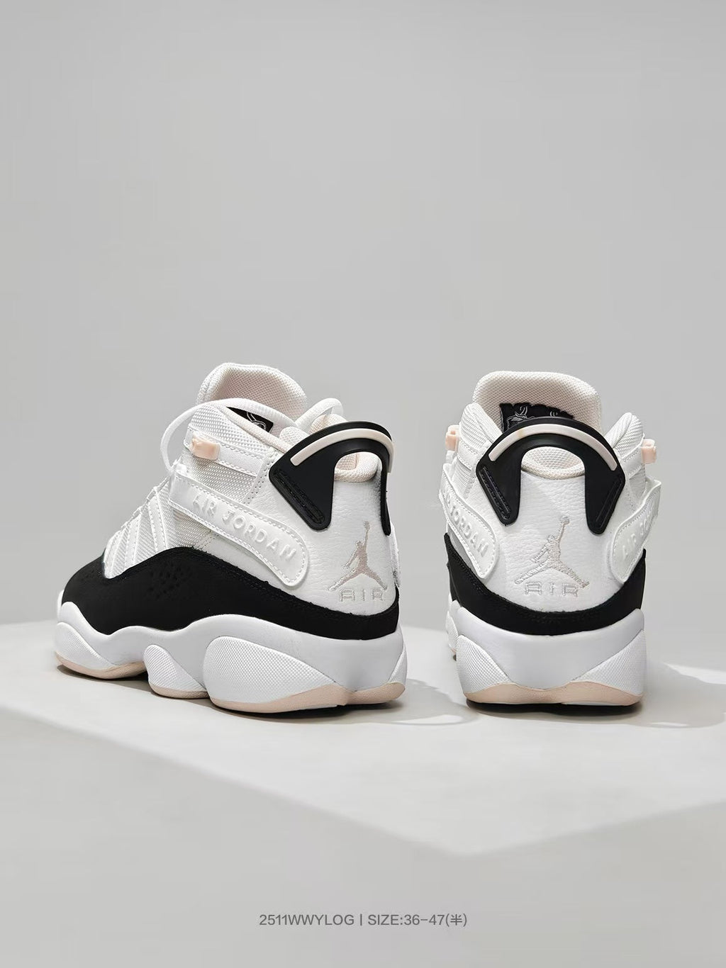 Jordan 8 Sneakers in White Black Pink - product image from the listing.