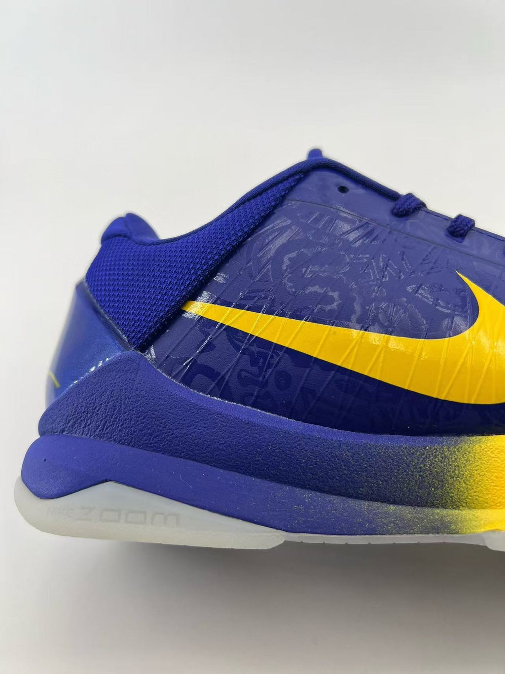 Nike Kobe 5 Protro Basketball Shoes in Blue Gold CD4991-400 - product image from the listing.