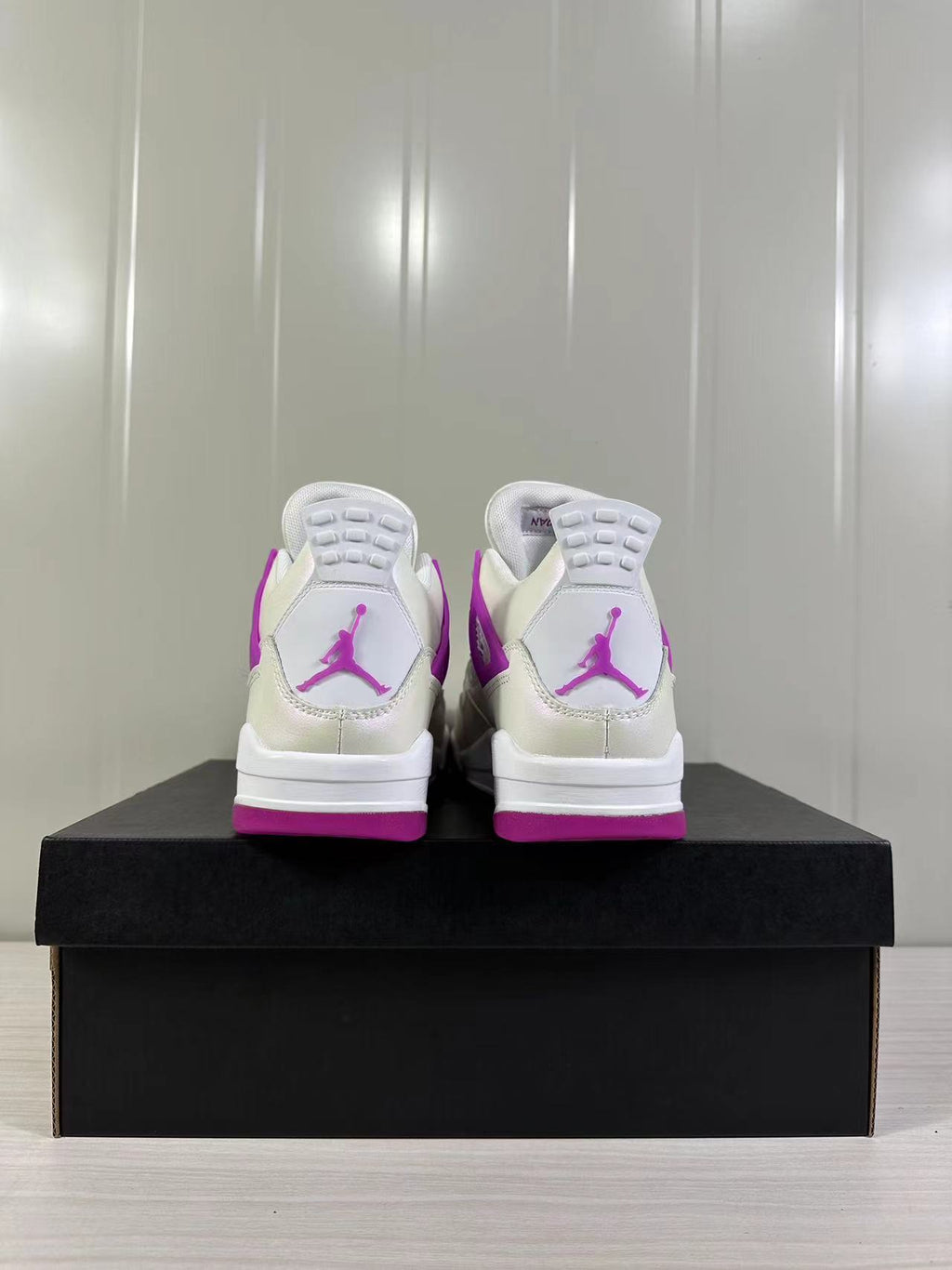 Air Jordan 4 Retro Hyper Violet Sneakers FQ1314-151 - product image from the listing.