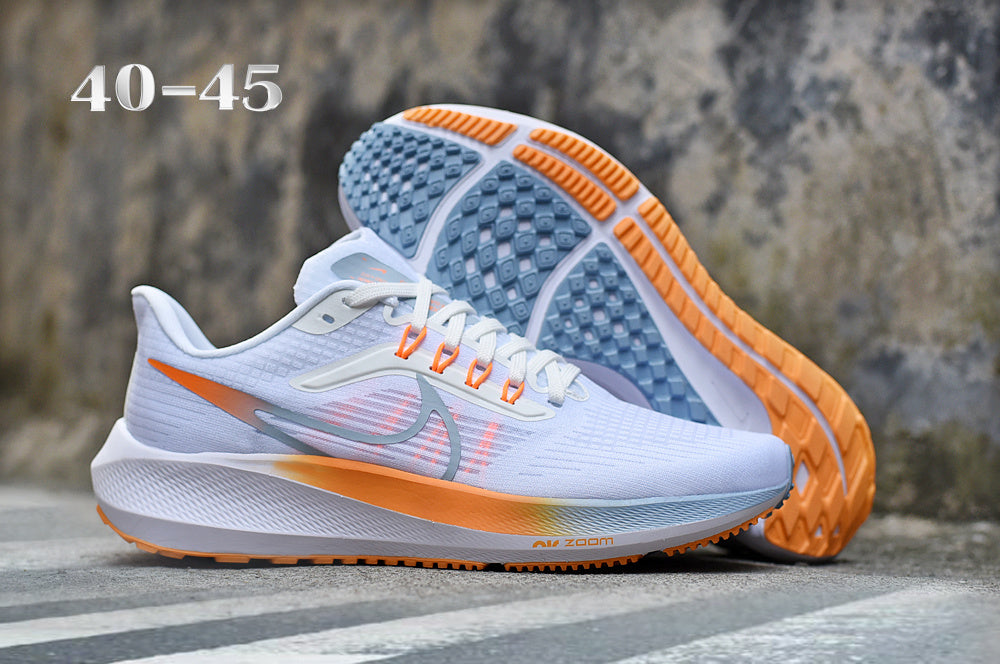 Nike Air Zoom Running Shoes in White Orange Yellow - product image from the listing.