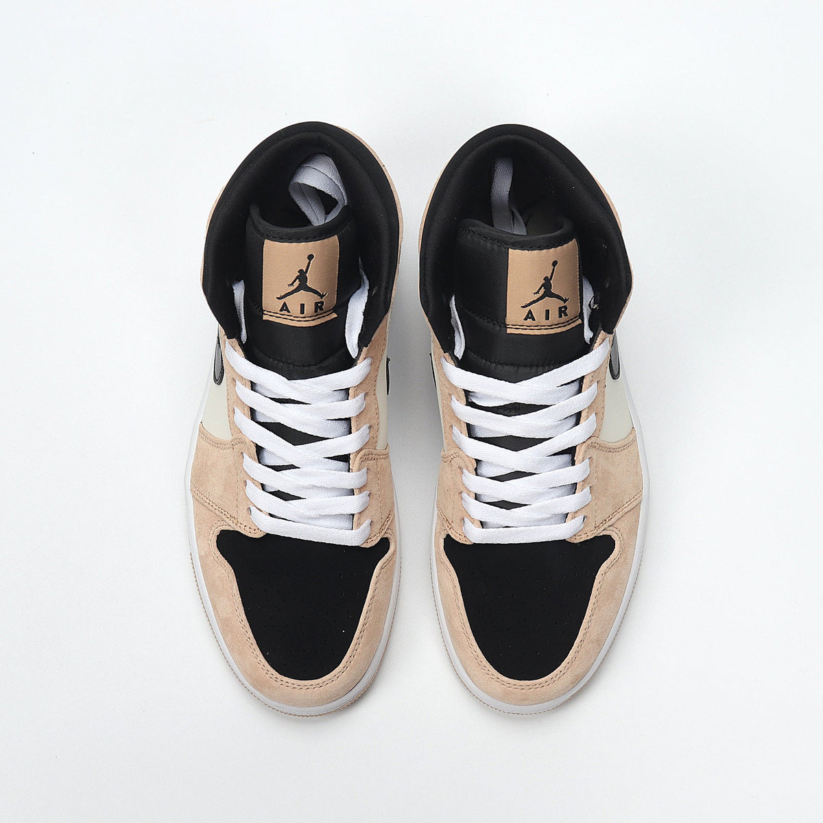 Jordan 1 Low BQ6472-800 Sneakers in Tan and Black - product image from the listing.