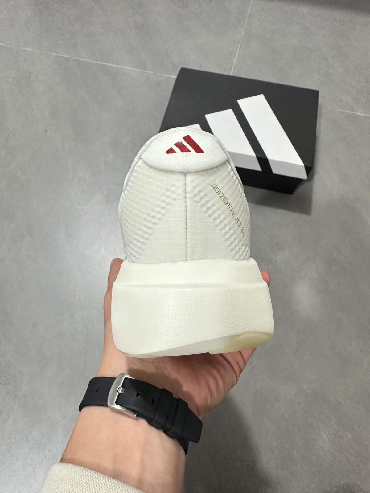 White and Burgundy Adidas Lightstrike Pro Running Shoes - product image from the listing.