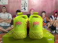 Lime Green and Coral PUMA Basketball Sneakers - product image from the listing.