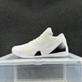 Nike Kobe 9 Low Basketball Shoes in White - product image from the listing.