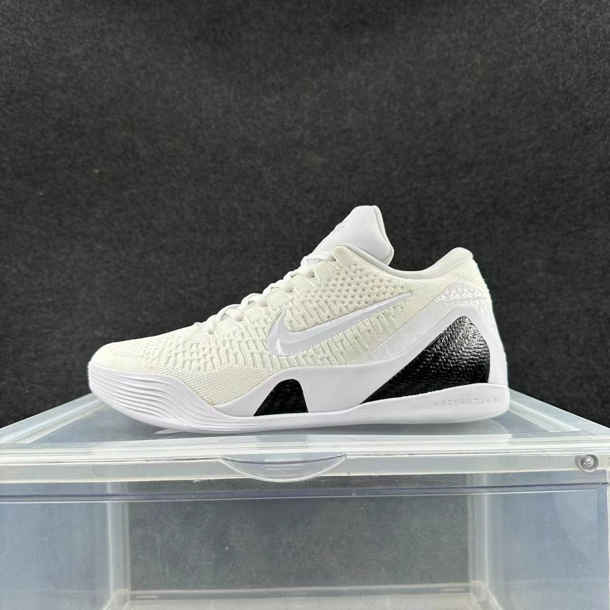 Nike Kobe 9 Low Basketball Shoes in White - product image from the listing.