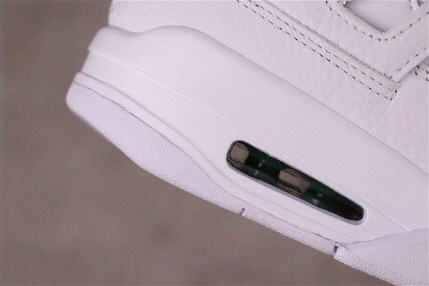 Pine Green Sneakers White/Green - Nike Air Jordan 4 CT8527-113 - product image from the listing.
