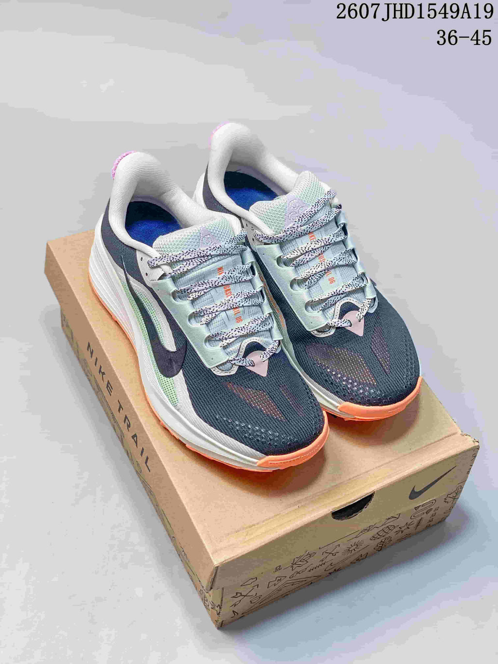 Nike Zoom Fly 5 Running Shoes in Navy White Orange - product image from the listing.
