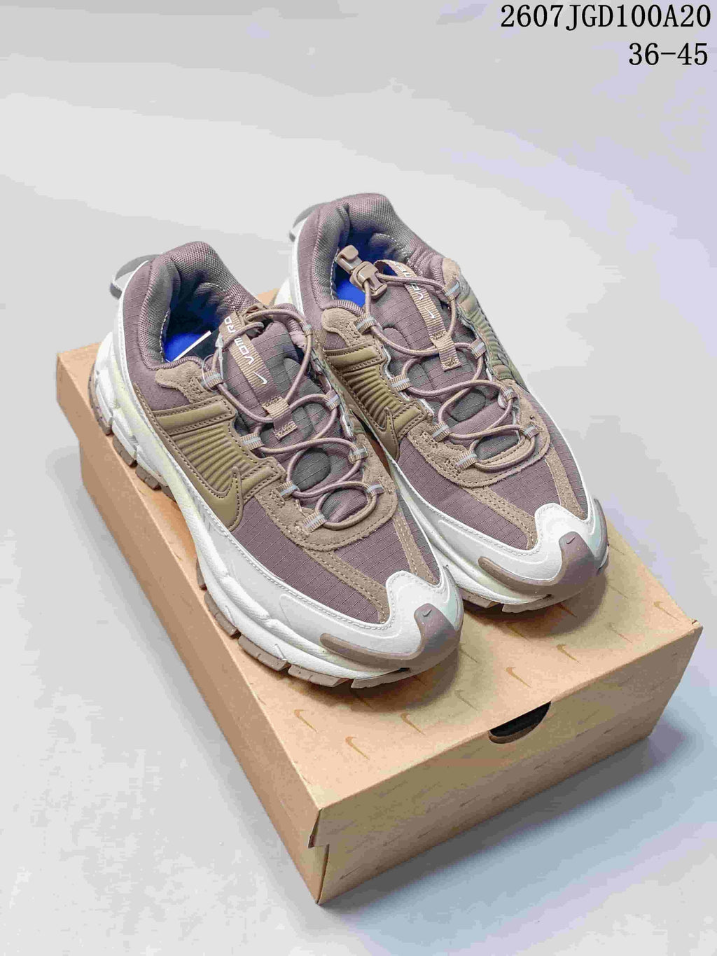 Nike Zoom Vomero Roam Sneakers in Taupe Gray 2607JGD100A20 - product image from the listing.