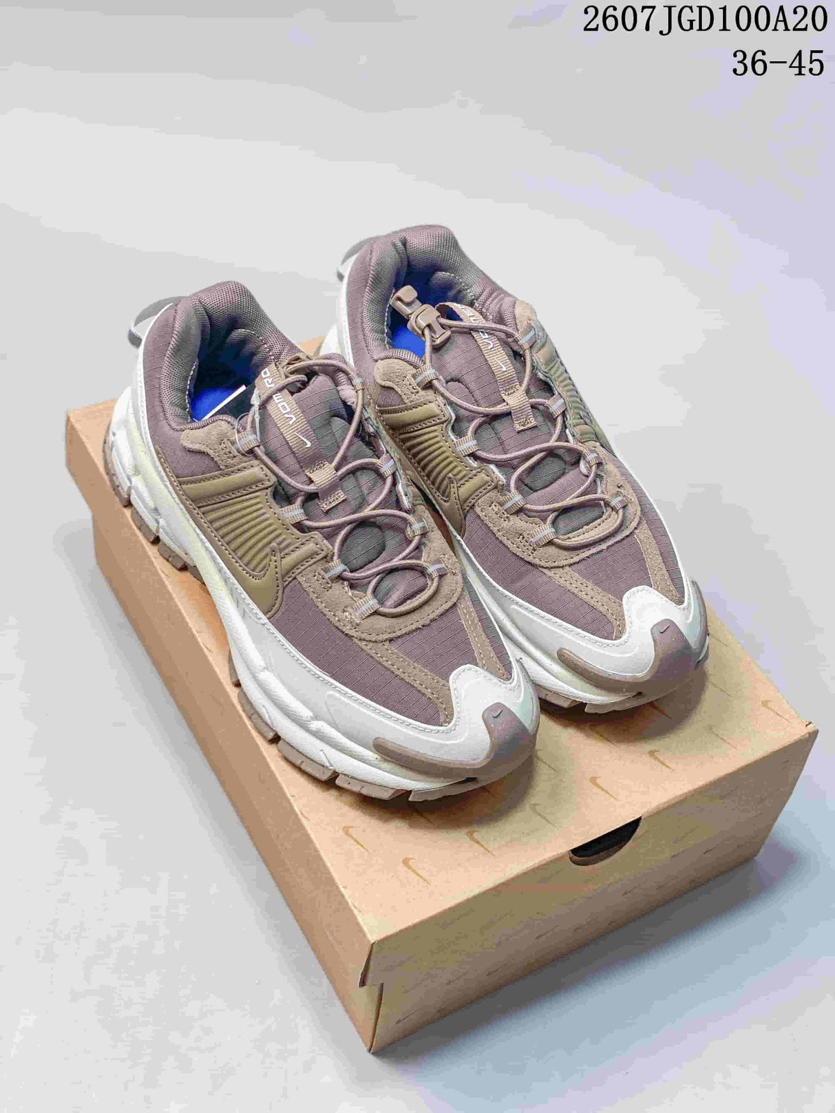 Nike Zoom Vomero Roam Sneakers in Taupe Gray 2607JGD100A20 - product image from the listing.