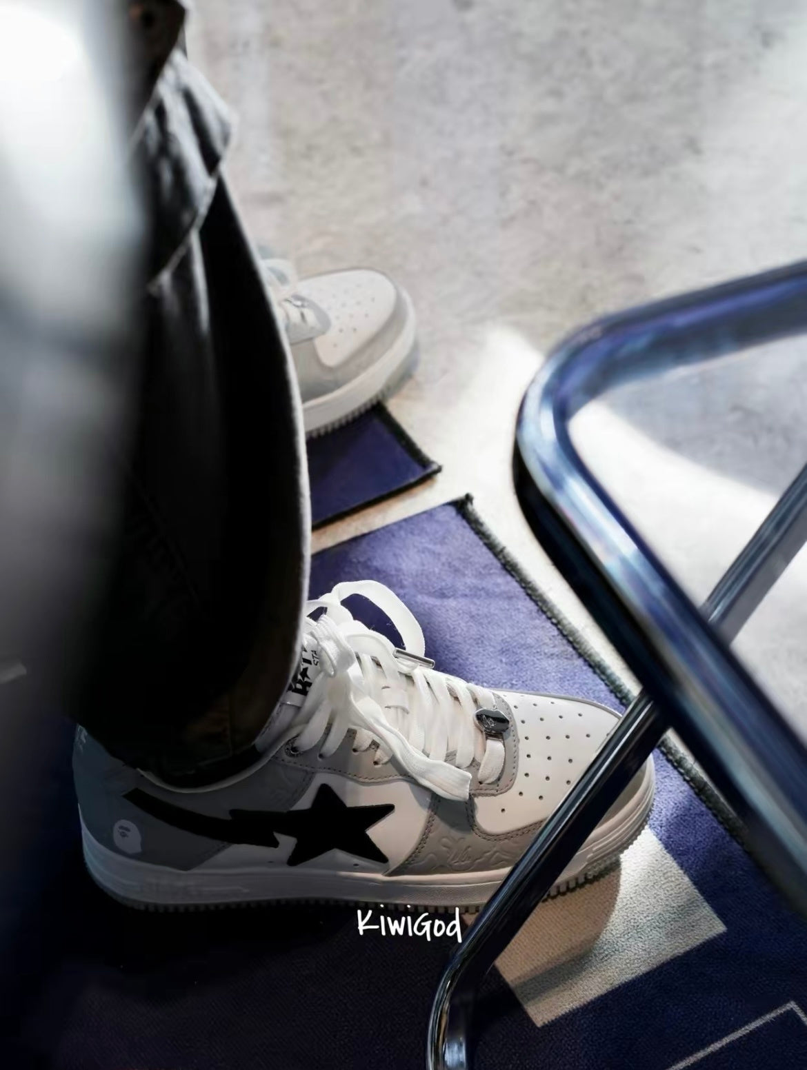 Gray and White BAPE STA Low Sneakers - product image from the listing.