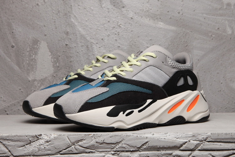 Men's Adidas 700 Sneakers in Gray, Black and Orange - product image from the listing.