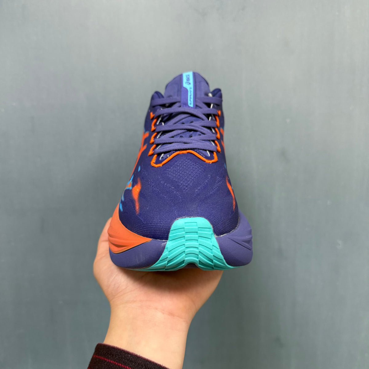361° P6 Running Shoes in Purple, in Orange and Aqua - product image from the listing.