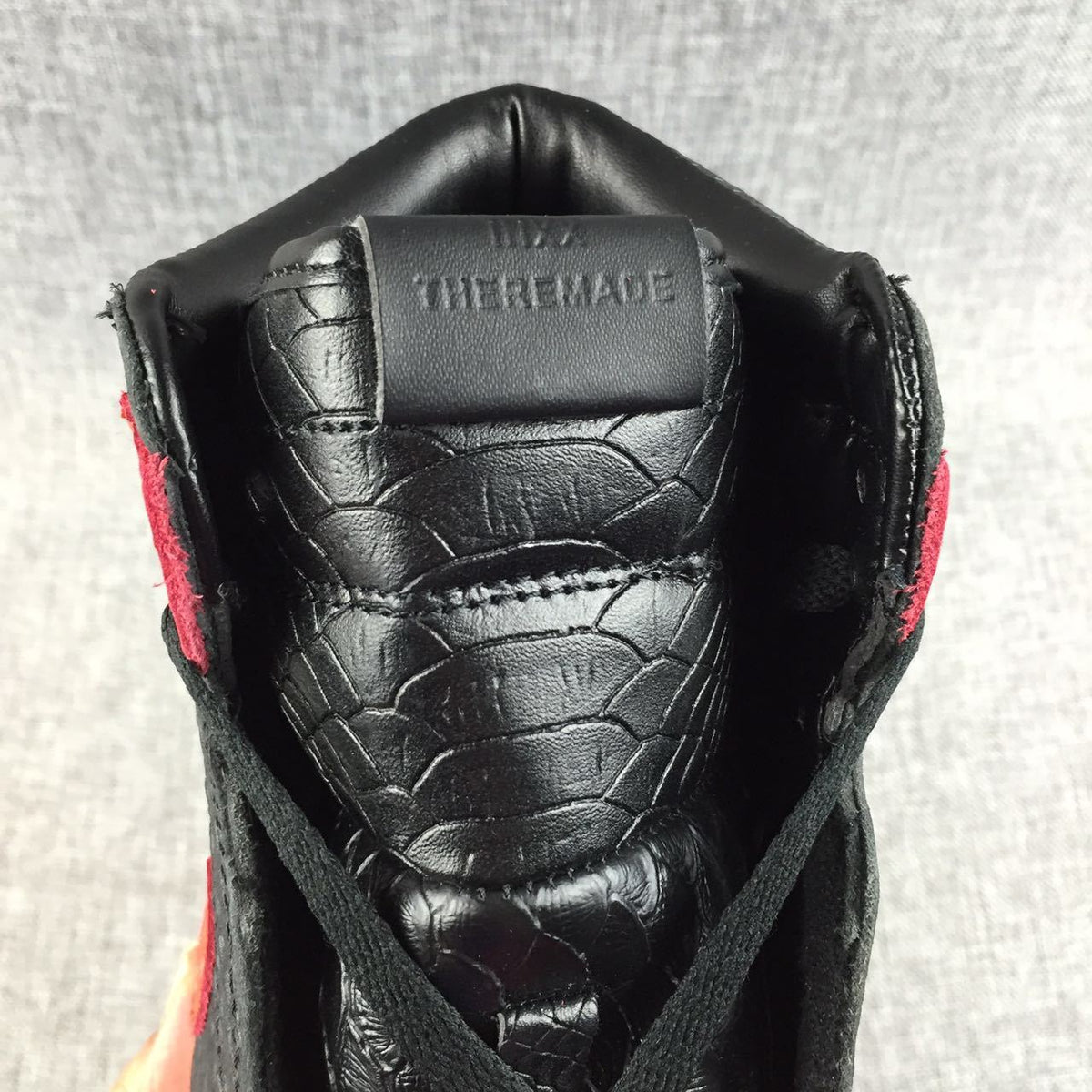 Black Red Scale-Textured Sneakers - Air Jordan 1 High - product image from the listing.