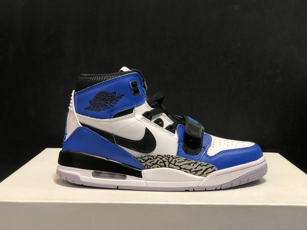 Jordan Legacy 312 High-Top Sneakers in White Blue AQ4160-104 - product image from the listing.