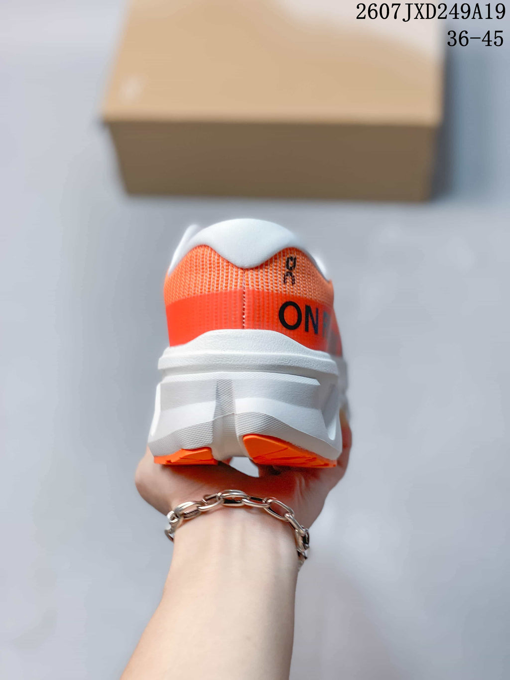 ON Cloudmonster 3 Hyper Sneakers in Orange 711490EEU - product image from the listing.