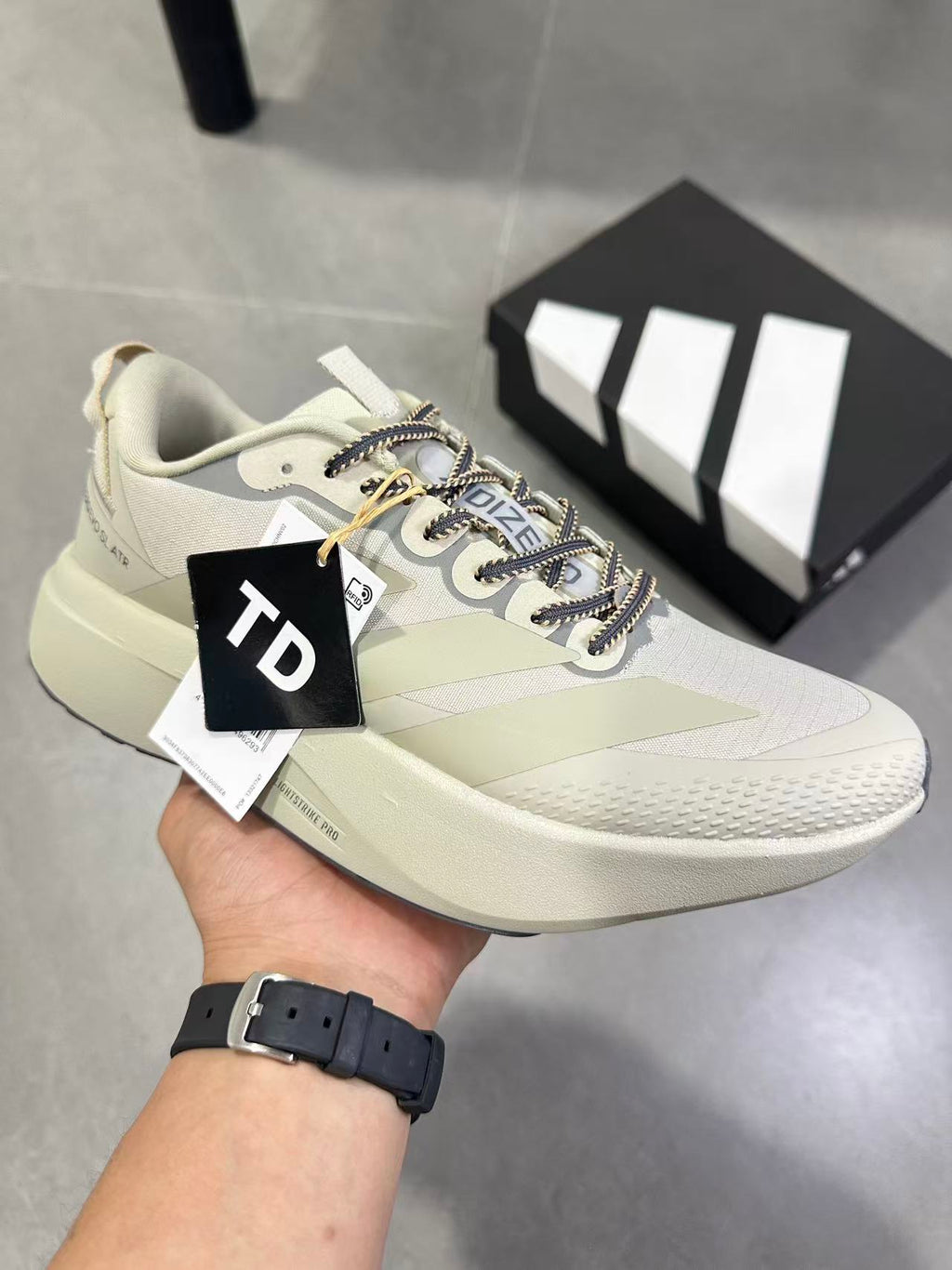 Adizero EVO SL ATR Running Shoes, in Light Brown - product image from the listing.