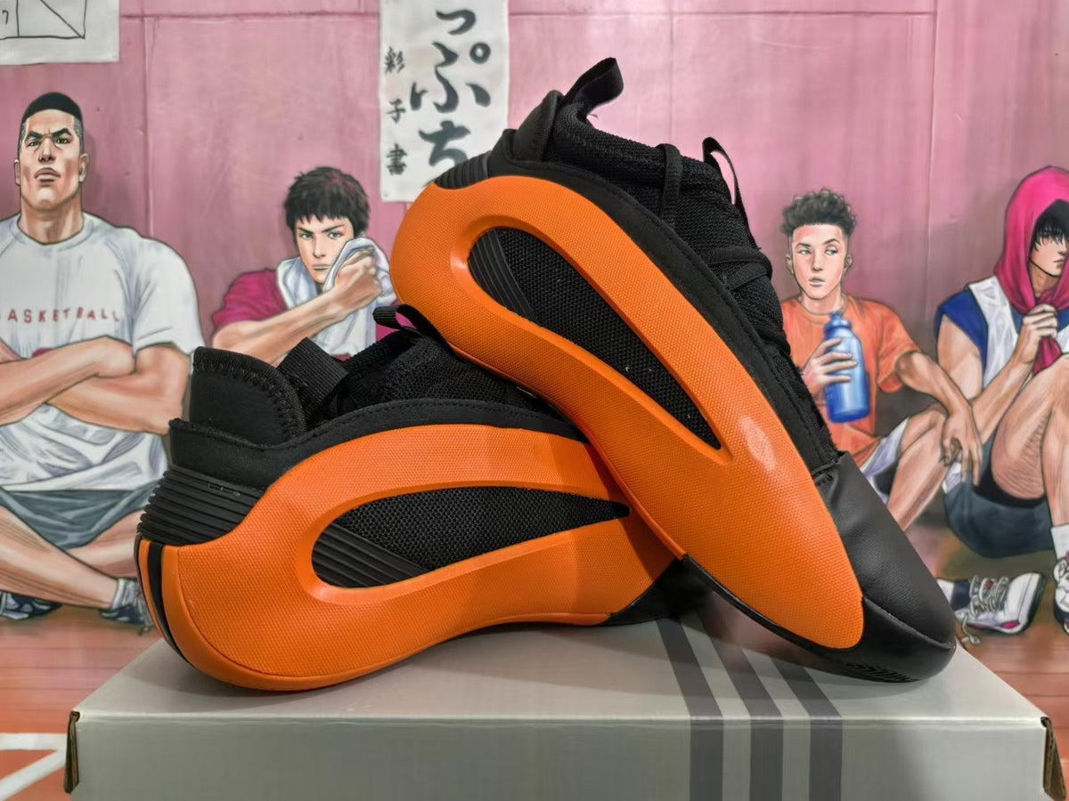 Basketball Sneakers in Black and Orange - product image from the listing.