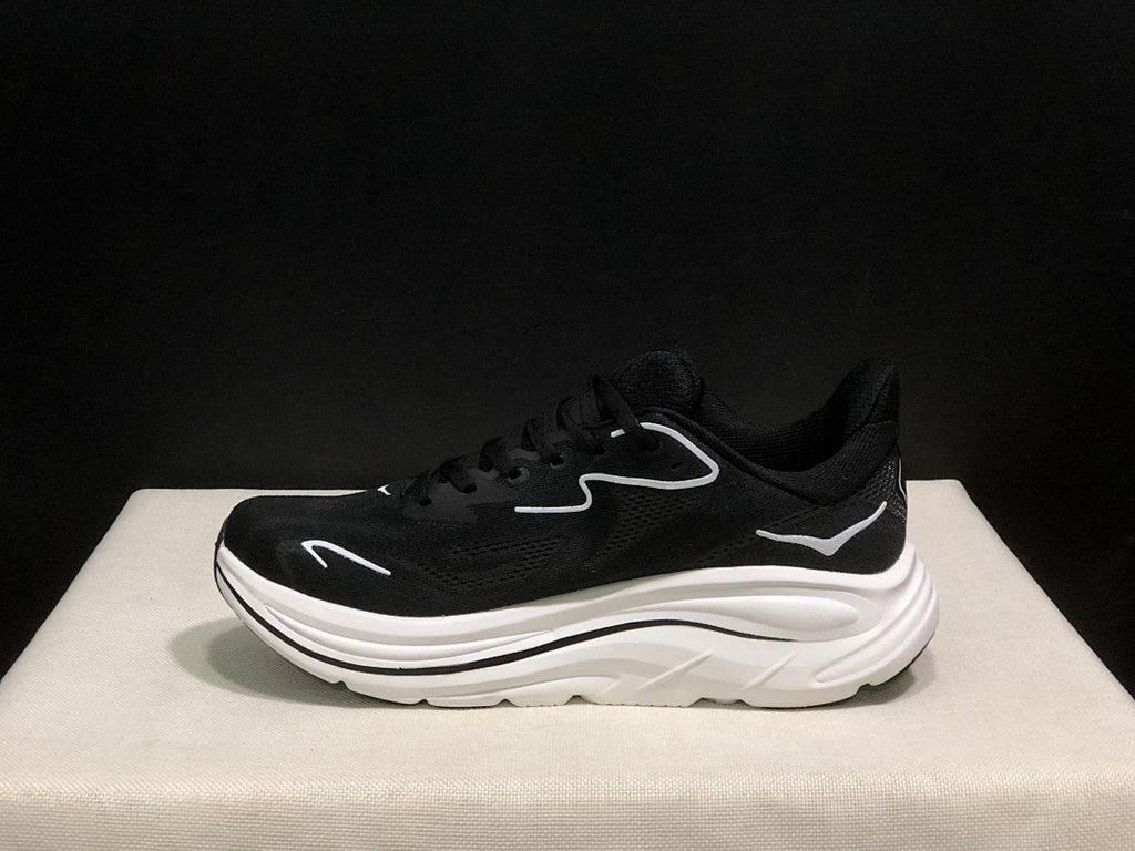 HOKA Clifton 10 Running Shoes in Black and White - product image from the listing.