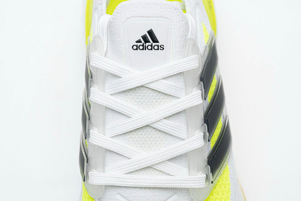 Adidas Ultraboost 21 Running Shoes FY0377 in White Yellow - product image from the listing.