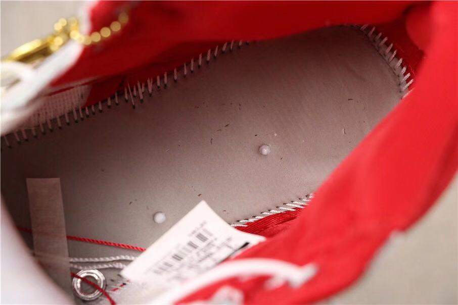 Air Jordan 1 Retro High OG Sneakers in White and Red - product image from the listing.