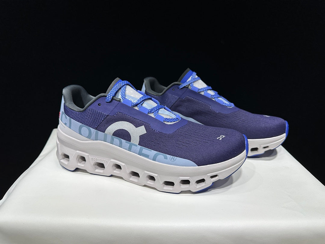 On Cloudmonster Running Shoes, in Navy and White - product image from the listing.