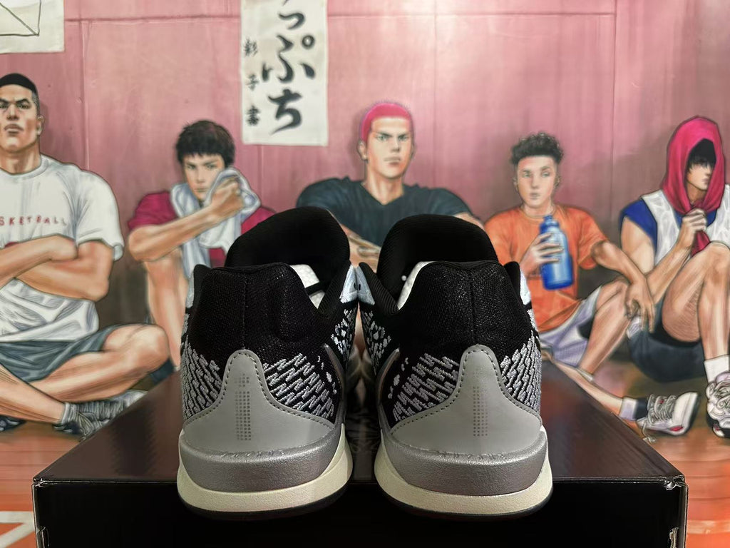 Nike Basketball Sneakers in Black and Silver - product image from the listing.