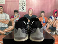 Nike Basketball Sneakers in Black and Silver - product image from the listing.