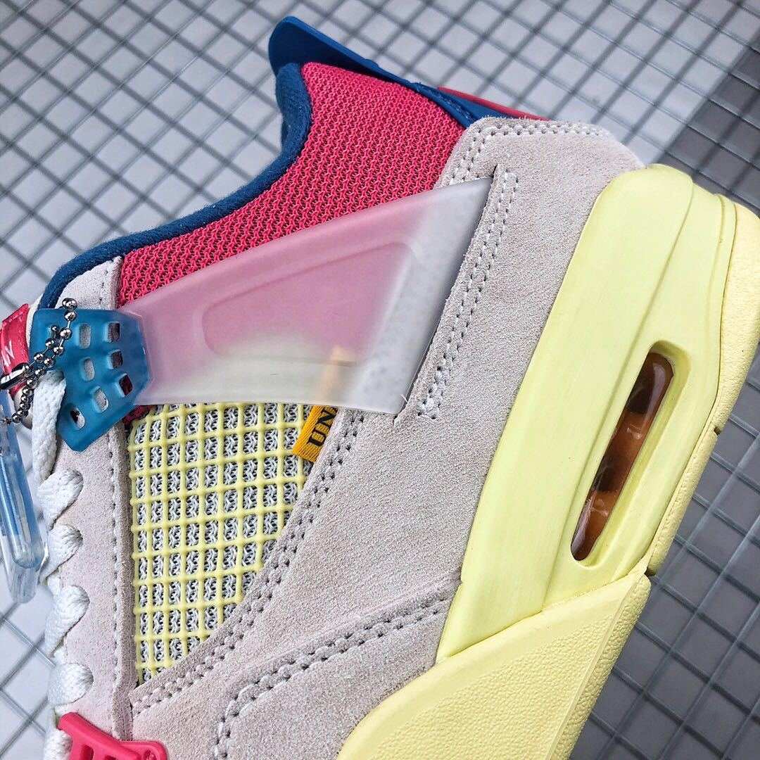 Union x Air Jordan 4 Sneakers in Pink Beige Navy Yellow - product image from the listing.