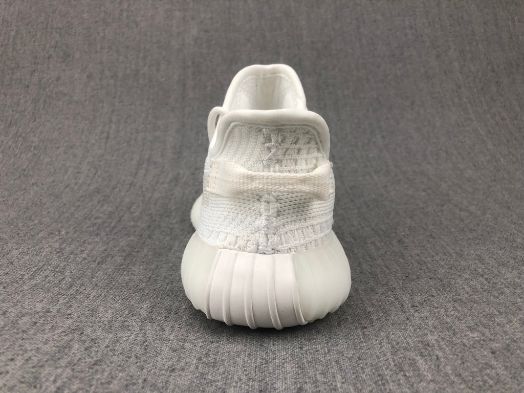 White Yeezy 350 V2 Kids Sneakers - product image from the listing.