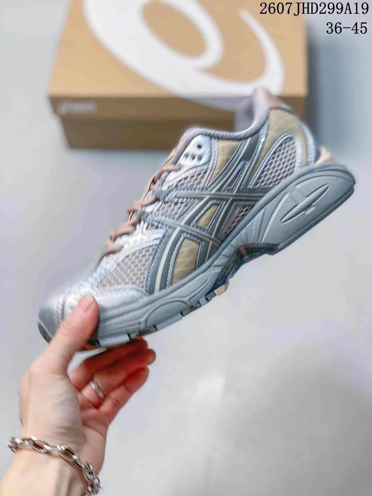ASICS Gel-Nimbus 10.1 Sneakers in Silver Peach 2607JHD299A19 - product image from the listing.