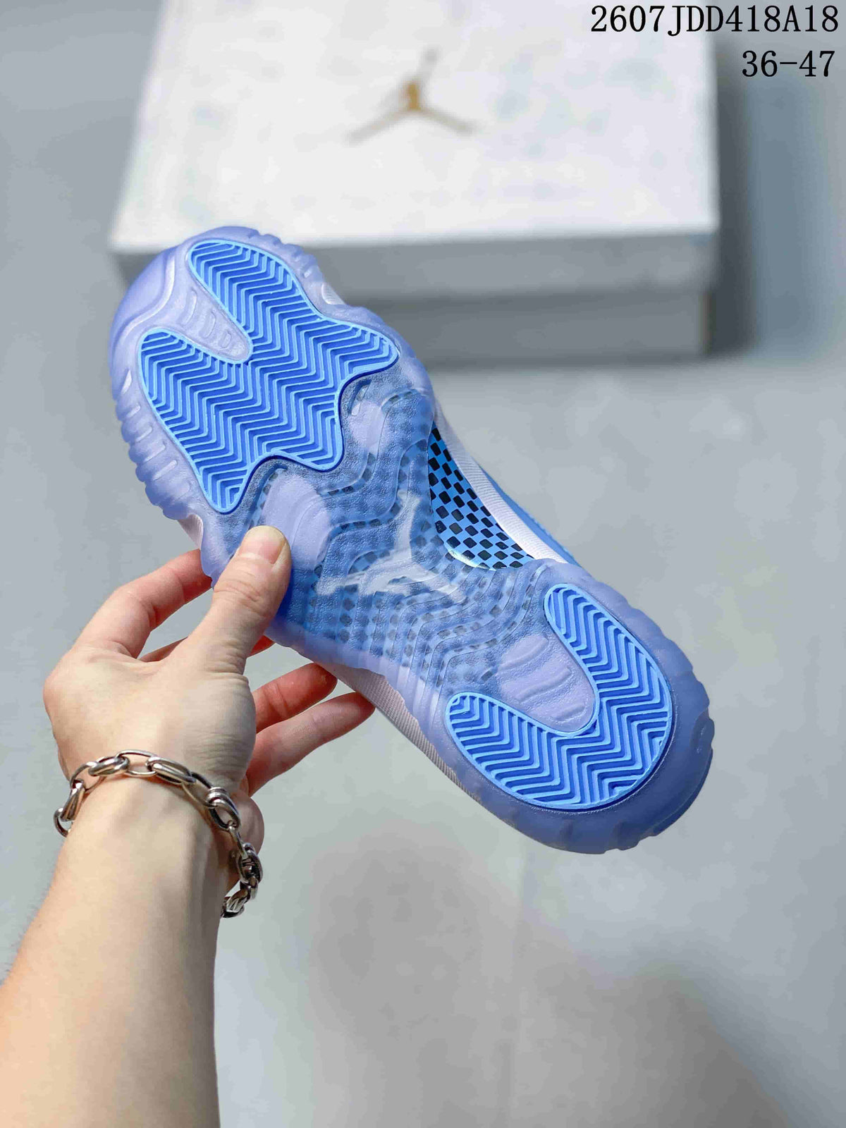 Air Jordan 11 Retro High-Top Sneakers Blue and White - product image from the listing.