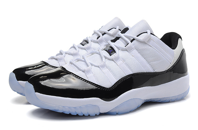 Air Jordan 11 Low Basketball Sneakers in White Black - product image from the listing.