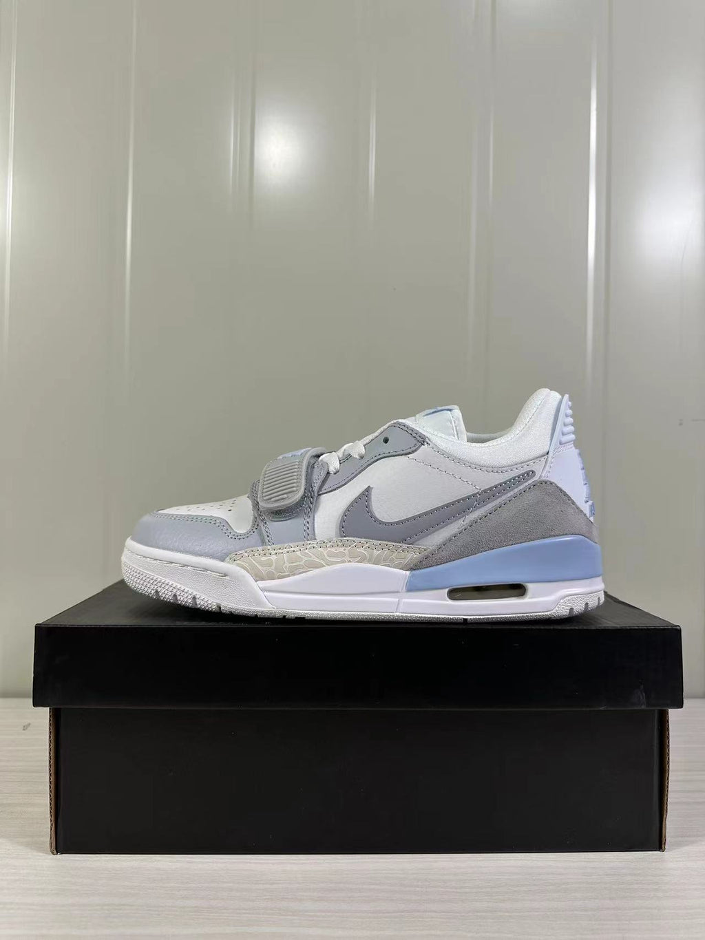 Jordan Legacy 312 Low Sneakers in Glacier Blue HQ1190-101 - product image from the listing.