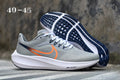 Smoke Gray and Orange Nike Zoom Running Shoes - product image from the listing.