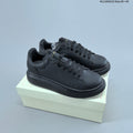 Alexander McQueen Oversized Low-Top Sneakers in Black HL11950123 - product image from the listing.