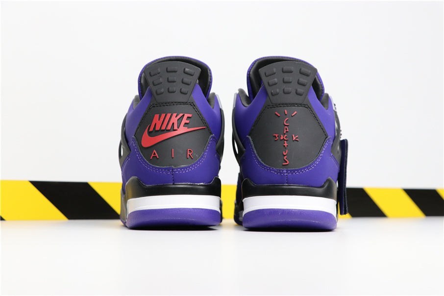 Jordan 4 Retro Sneakers in Purple Suede 308497-406 - product image from the listing.