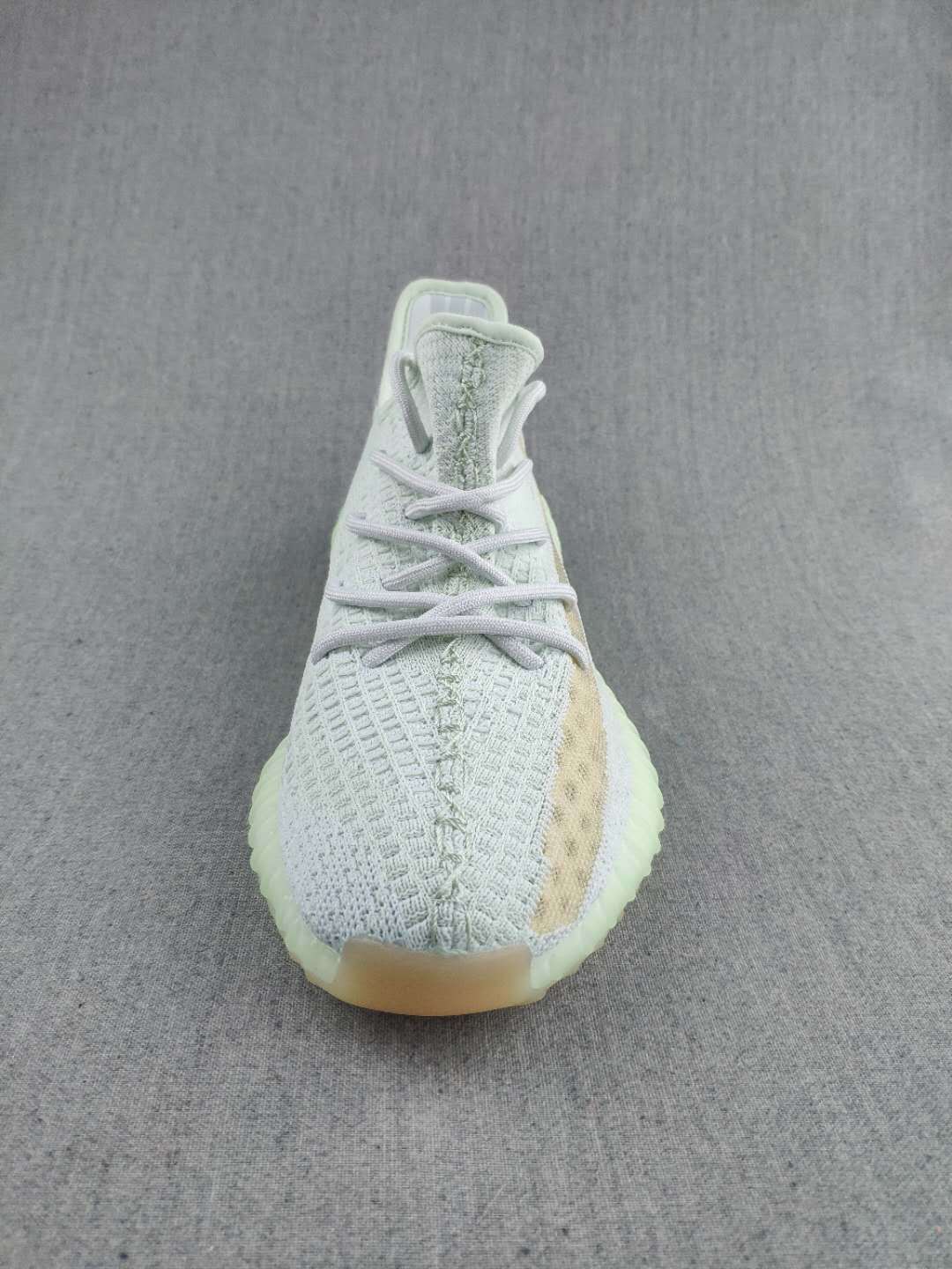 White and Tan Yeezy 350 V2 Knit Sneakers - product image from the listing.