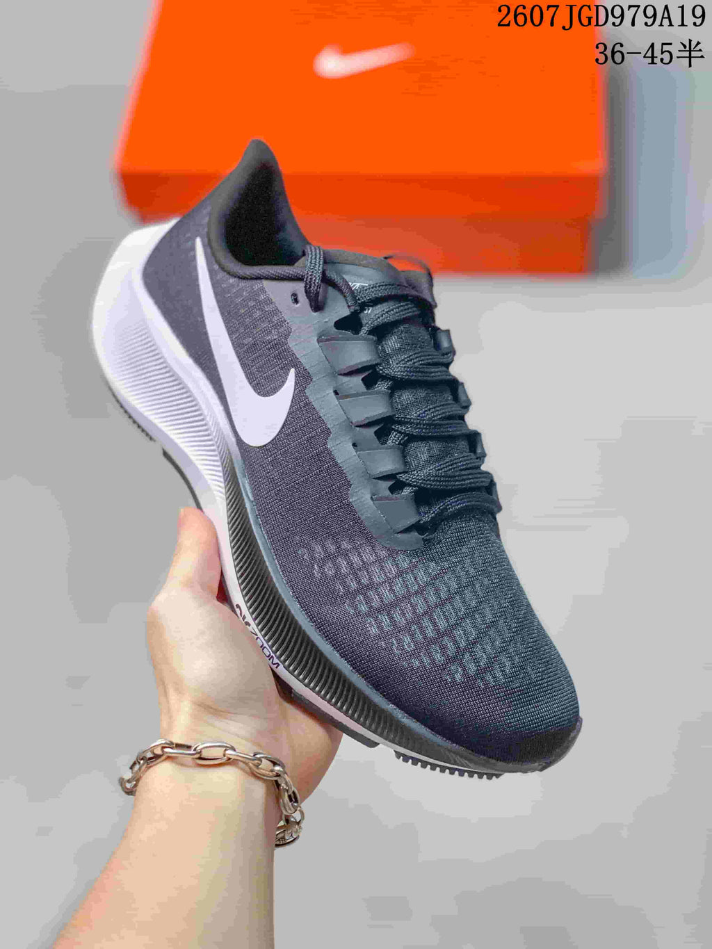 Nike Pegasus 37 Running Sneakers in Black and White - product image from the listing.