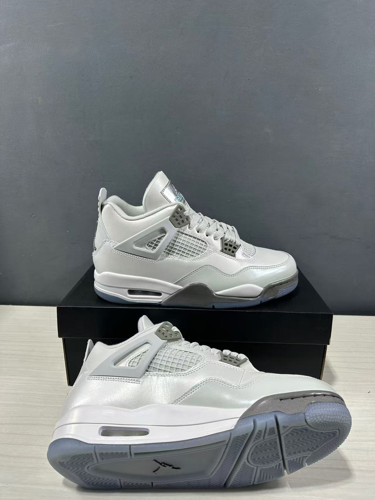 Air Jordan 4 Photon Dust Sneakers HV4401-014 - product image from the listing.