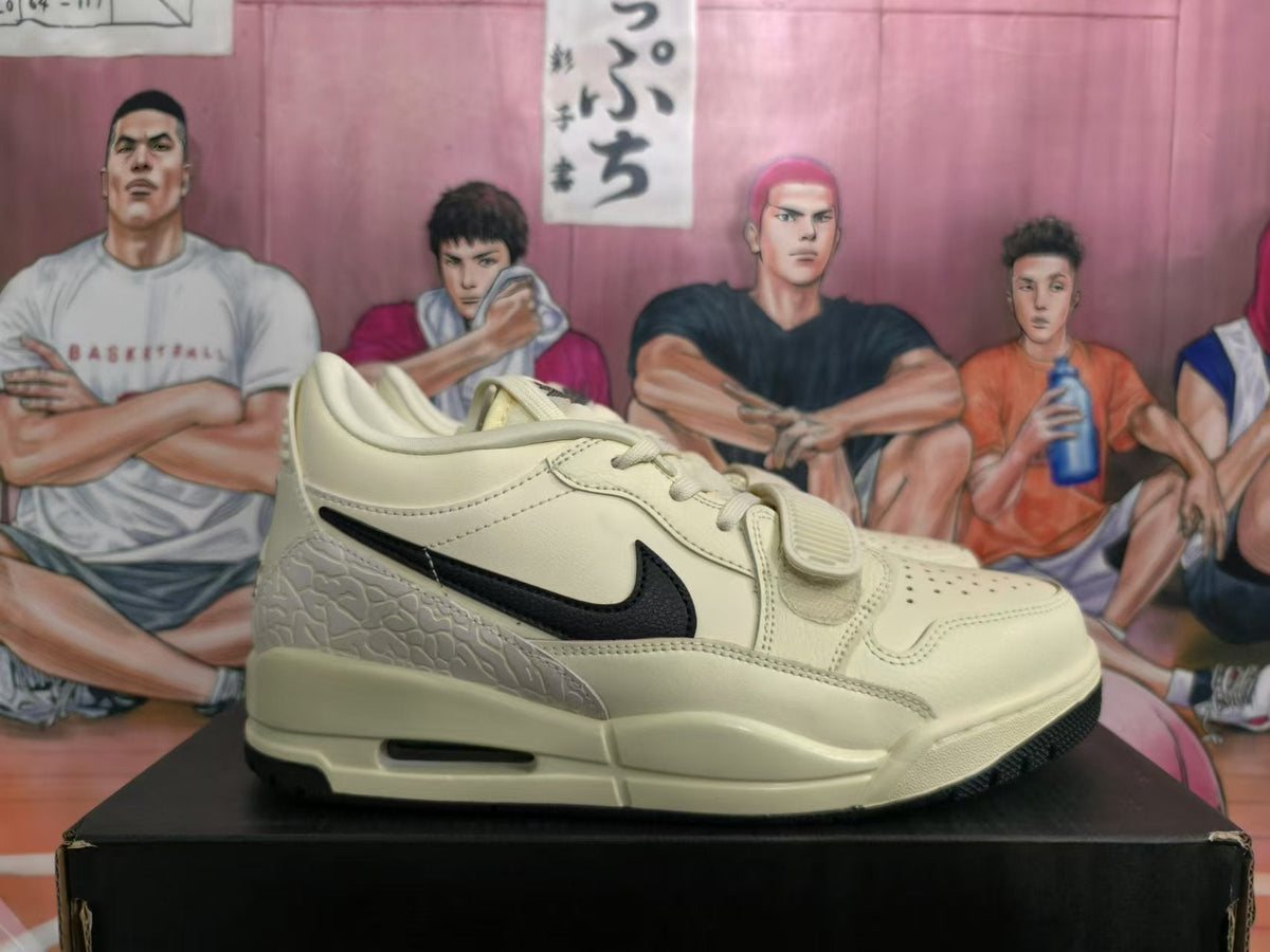 Cream and Black Jordan Legacy 312 Low Sneakers - product image from the listing.