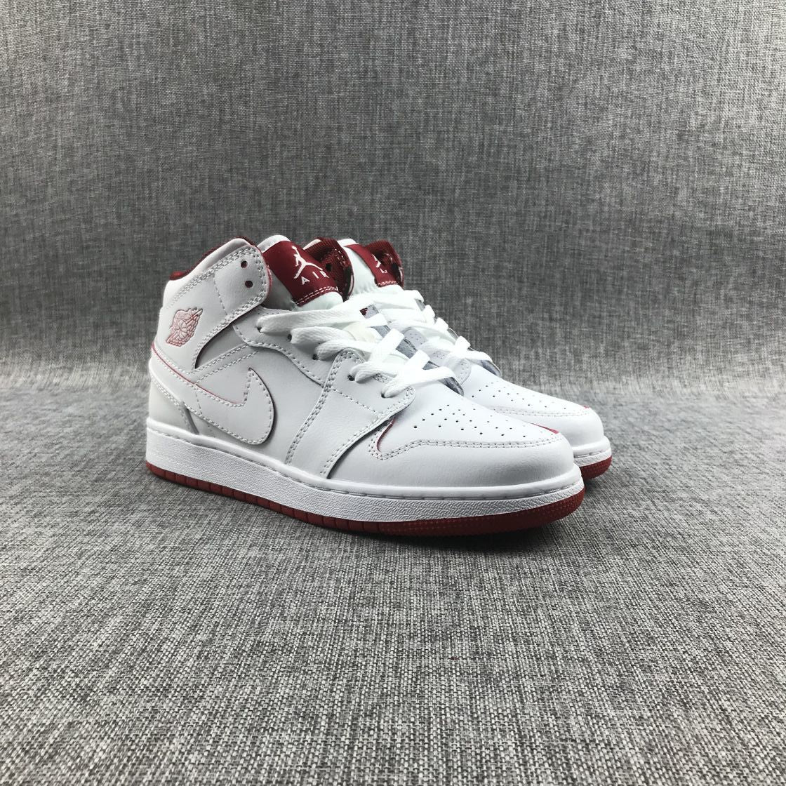 Air Jordan 1 Mid Sneakers in White and Red 554725-103 - product image from the listing.