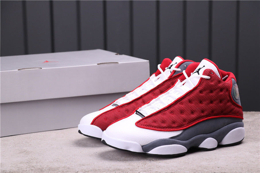 Air Jordan 13 Red Flint Sneakers 414571-600 - product image from the listing.