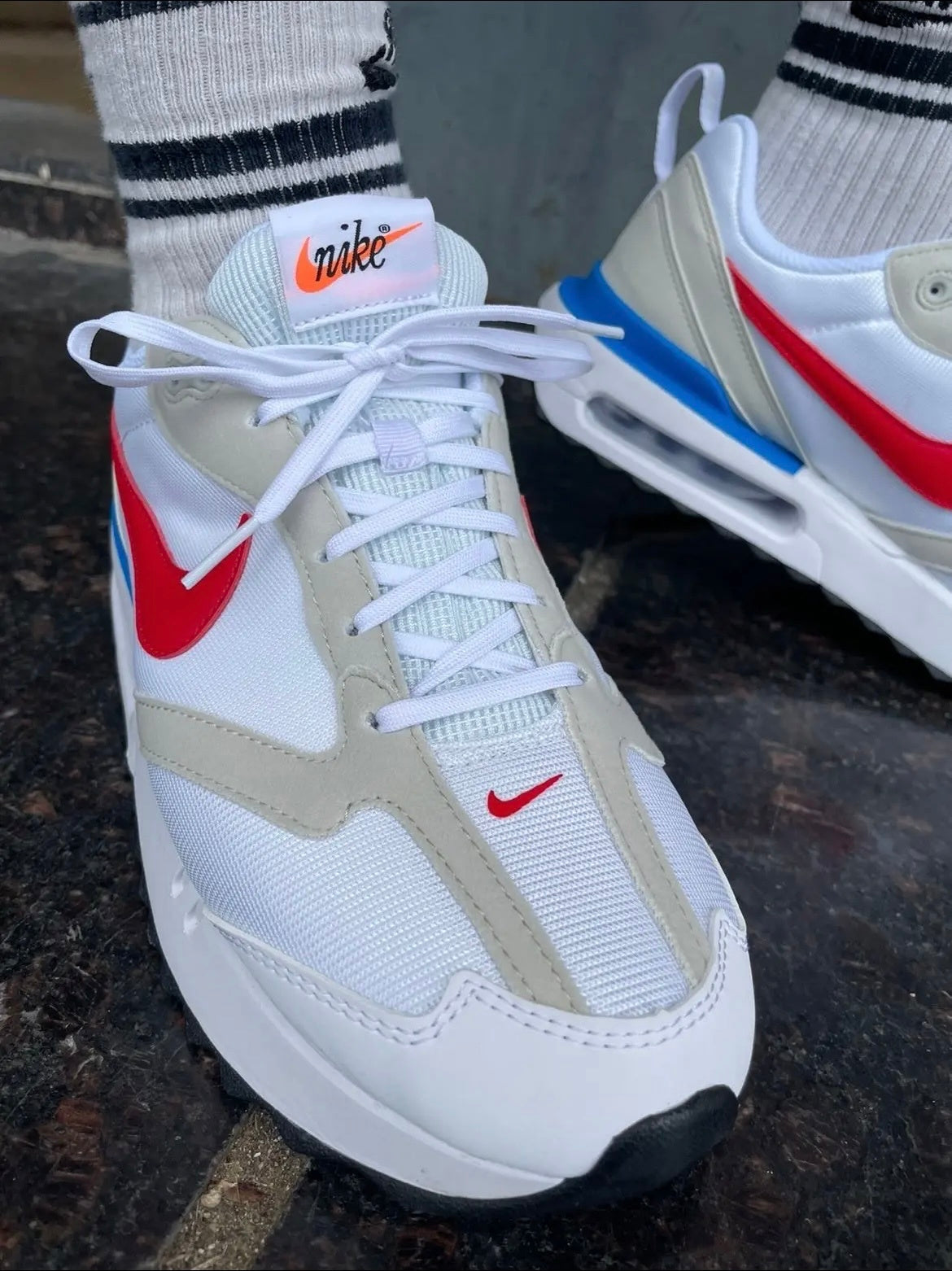 Nike Air Max Dawn Sneakers in White Red Blue DM0013-100 - product image from the listing.
