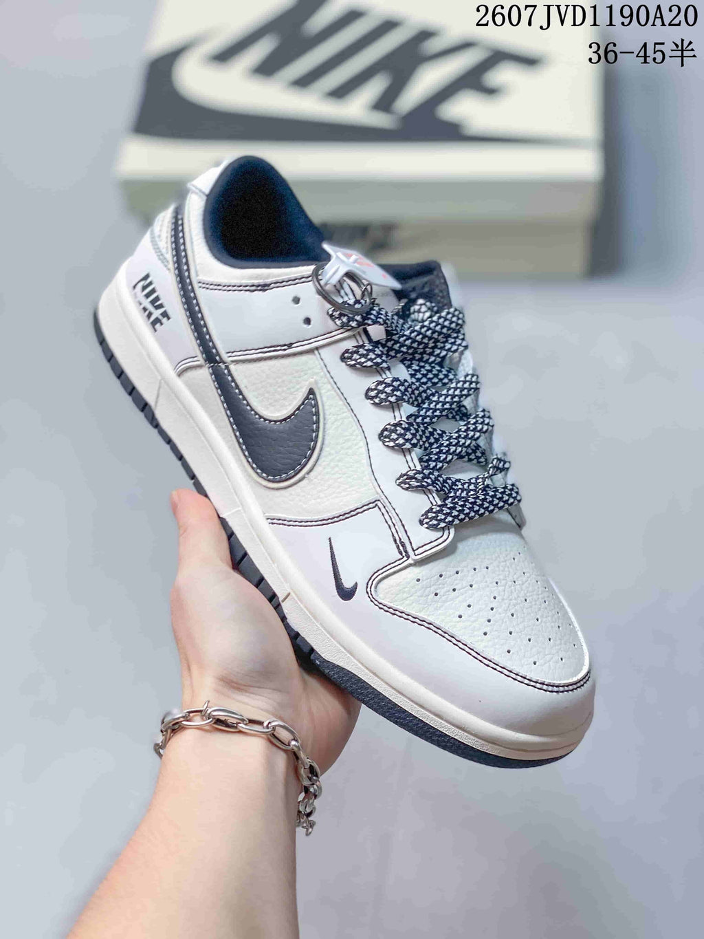 Nike SB Dunk Low Low-Top Sneakers in Off-White Black - product image from the listing.