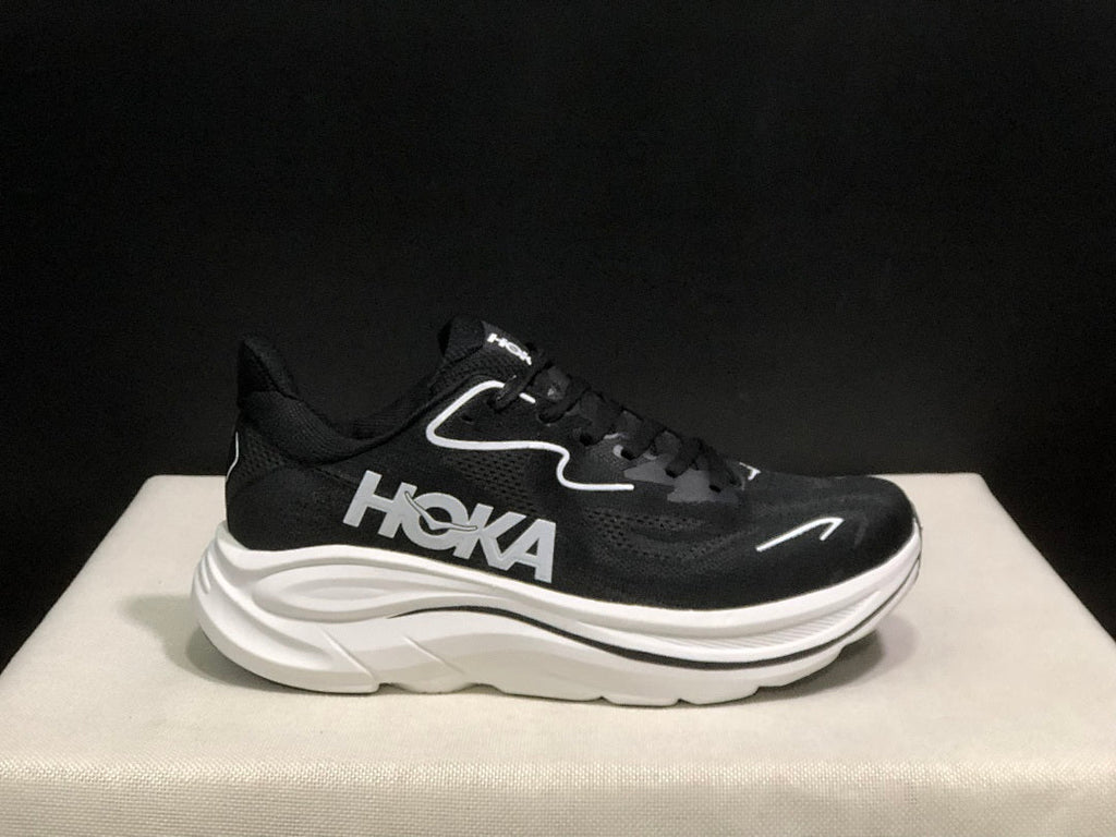 HOKA Clifton 10 Running Shoes in Black and White - product image from the listing.