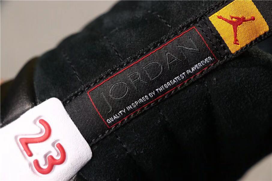Air Jordan 12 Reverse Taxi Sneakers Black 153265-017 - product image from the listing.