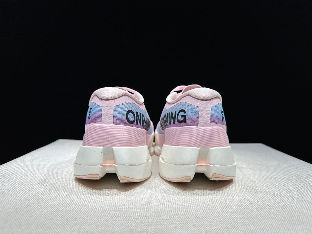 Pink and Blue On Cloudboom Max Running Shoes - product image from the listing.