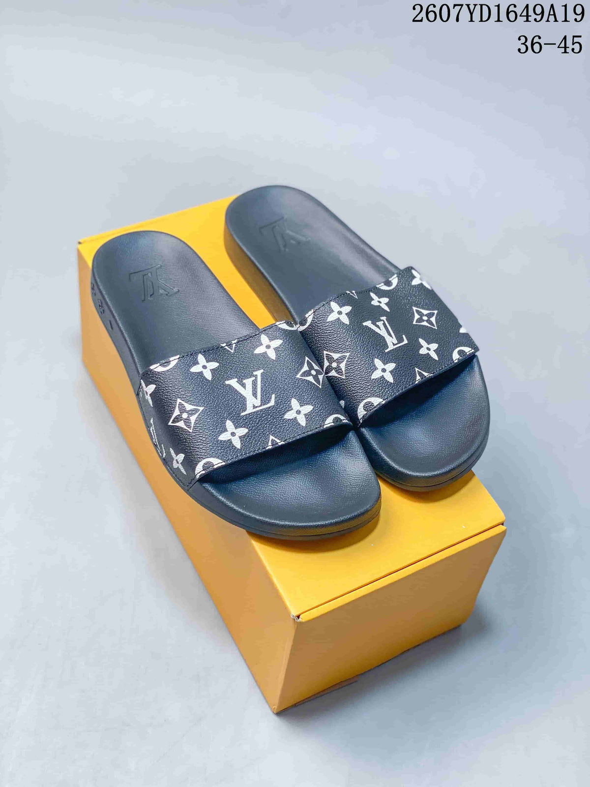 Louis Vuitton Monogram Platform Slide Sandals in Black 2607YD1649A19 - product image from the listing.